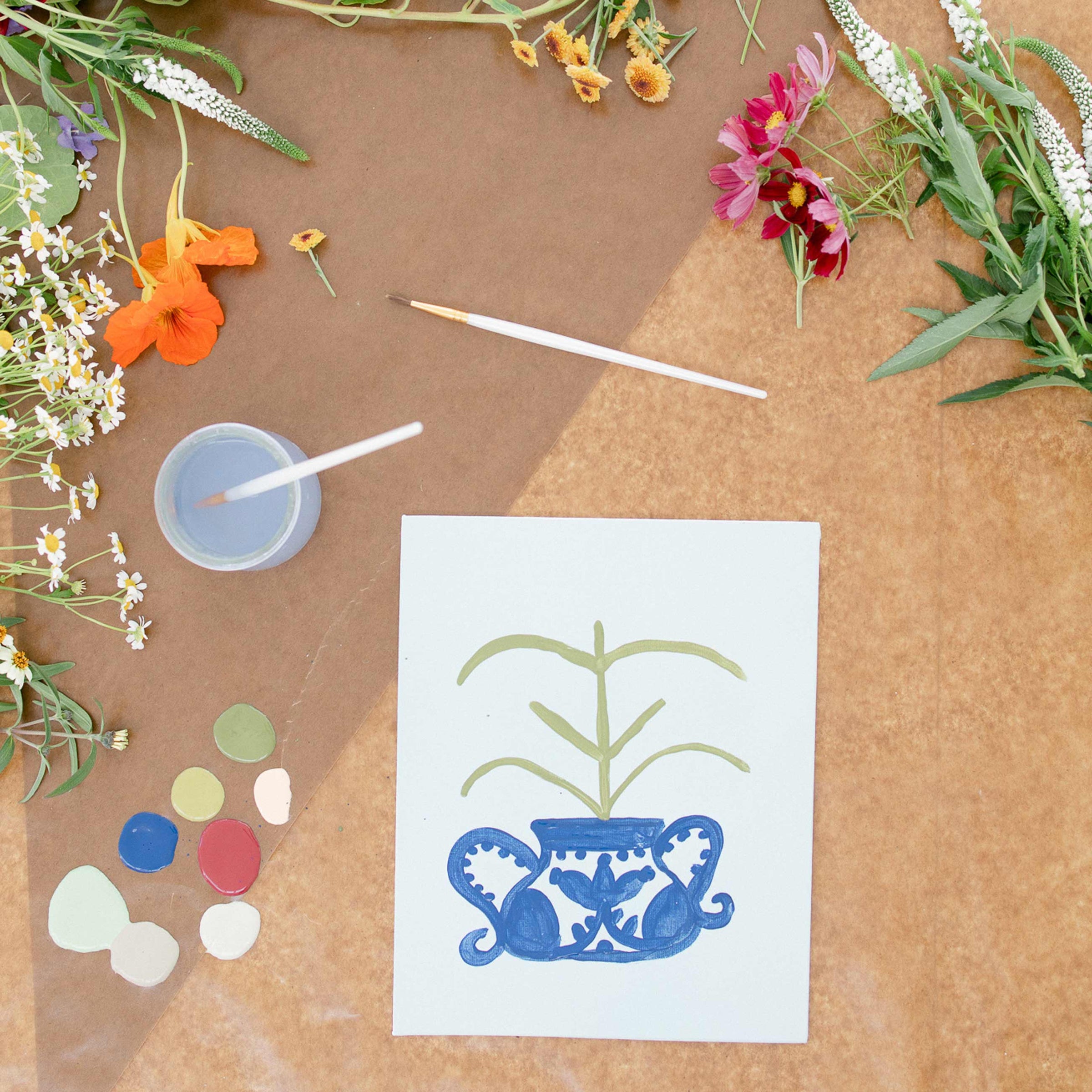 Simple painting of a plant in a pot on canvas for a flower pressing craft.